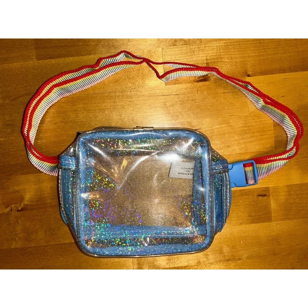 Girls Clear crossbody purse with blue trim and adjustable rainbow strap